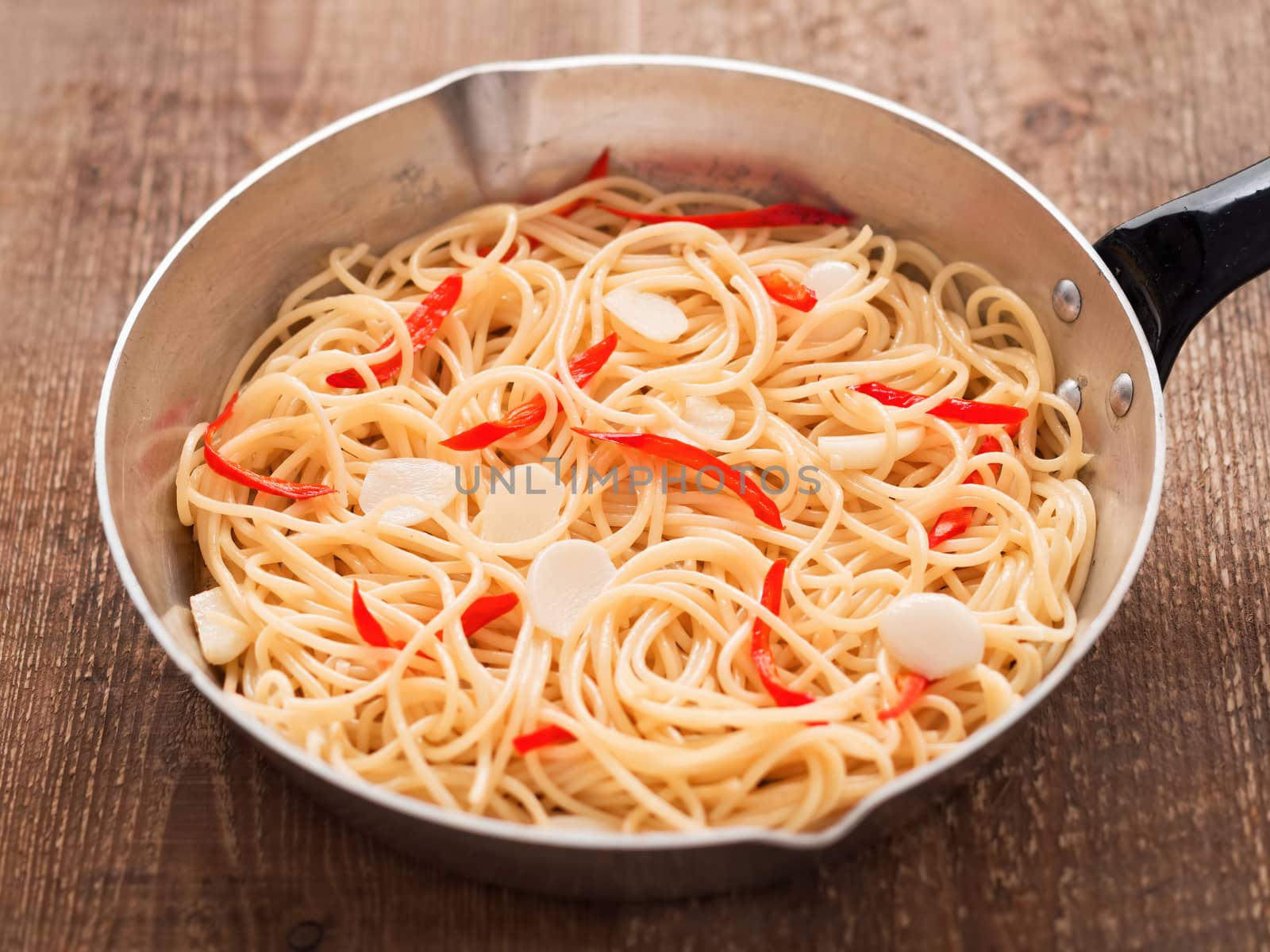 close up of rustic traditional italian aglio olio spaghetti pasta