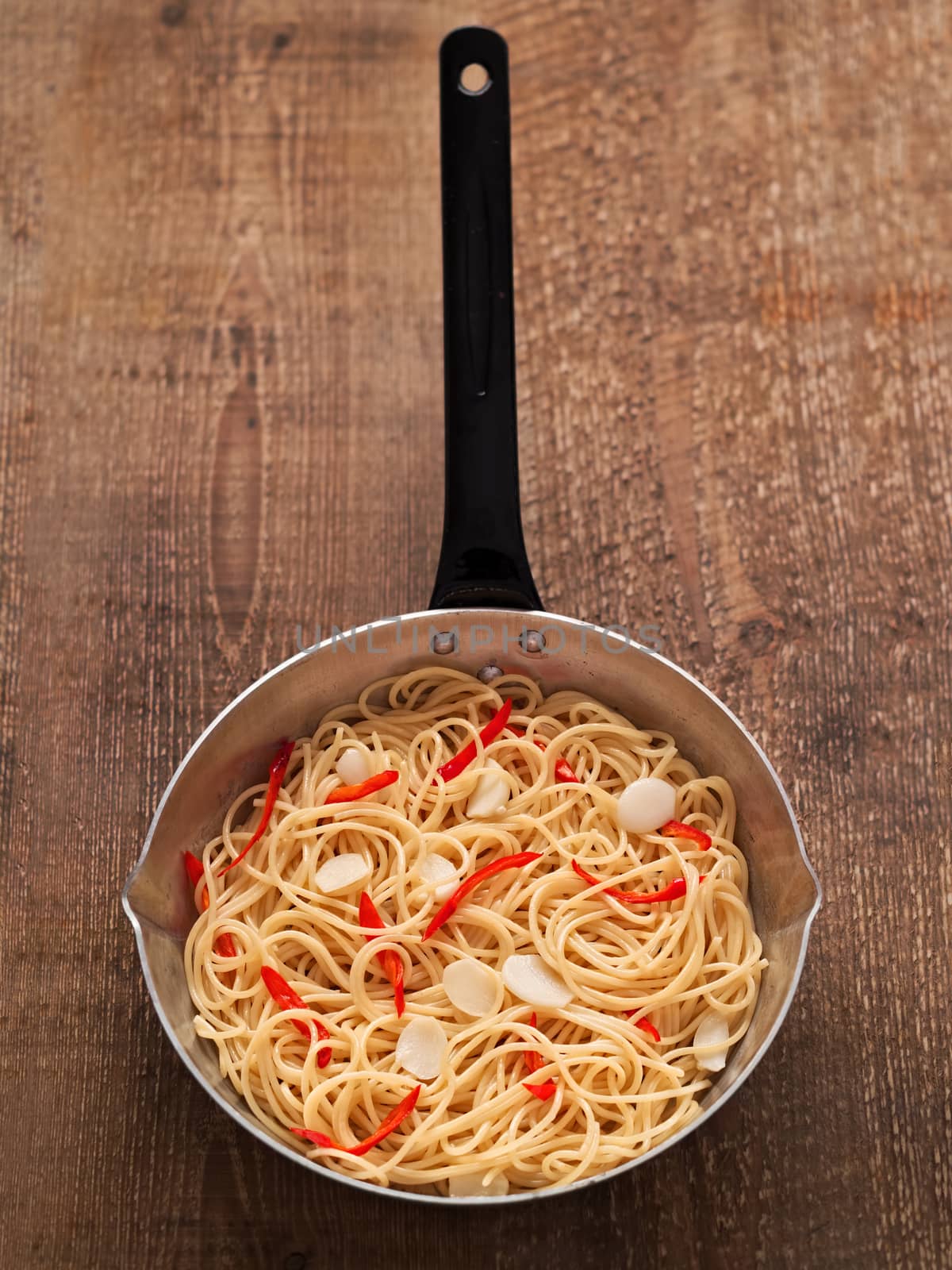 close up of rustic traditional italian aglio olio spaghetti pasta