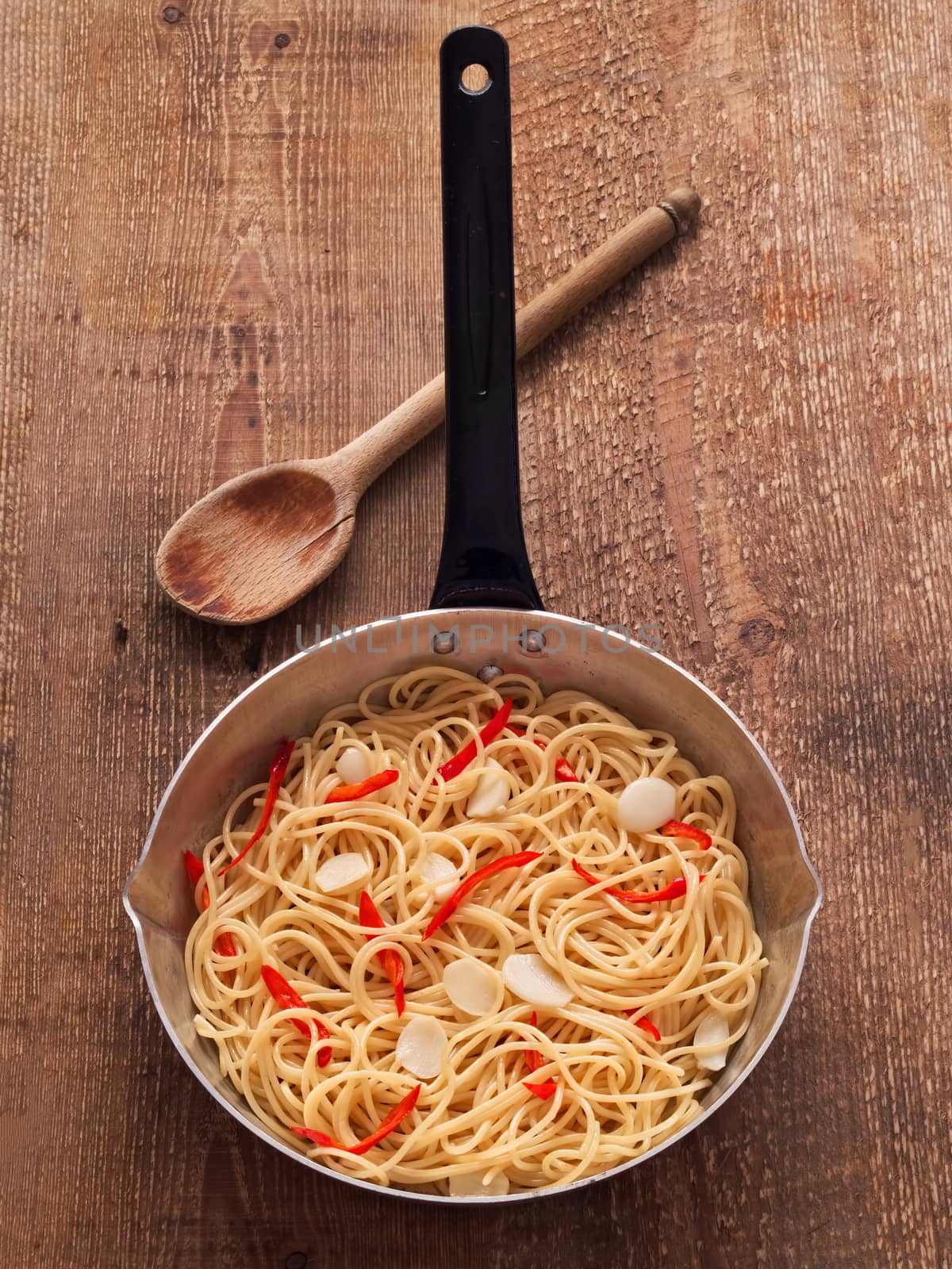 close up of rustic traditional italian aglio olio spaghetti pasta