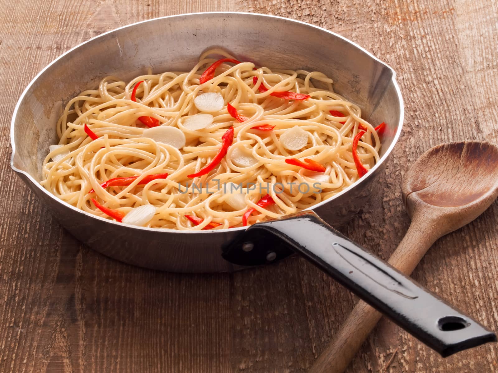 close up of rustic traditional italian aglio olio spaghetti pasta