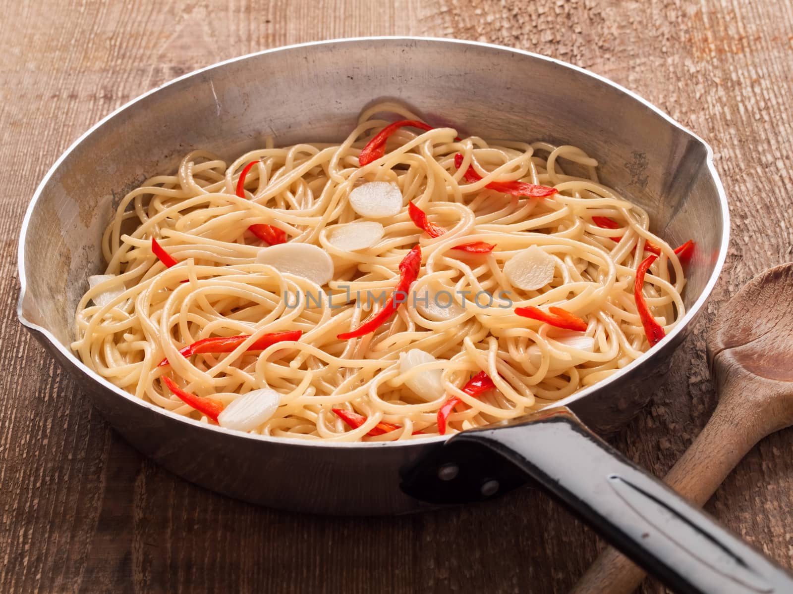 close up of rustic traditional italian aglio olio spaghetti pasta