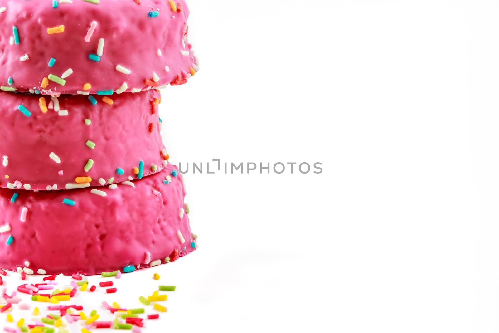 Strawberry donuts with chocolate shavings color on white background.Horizontal image.