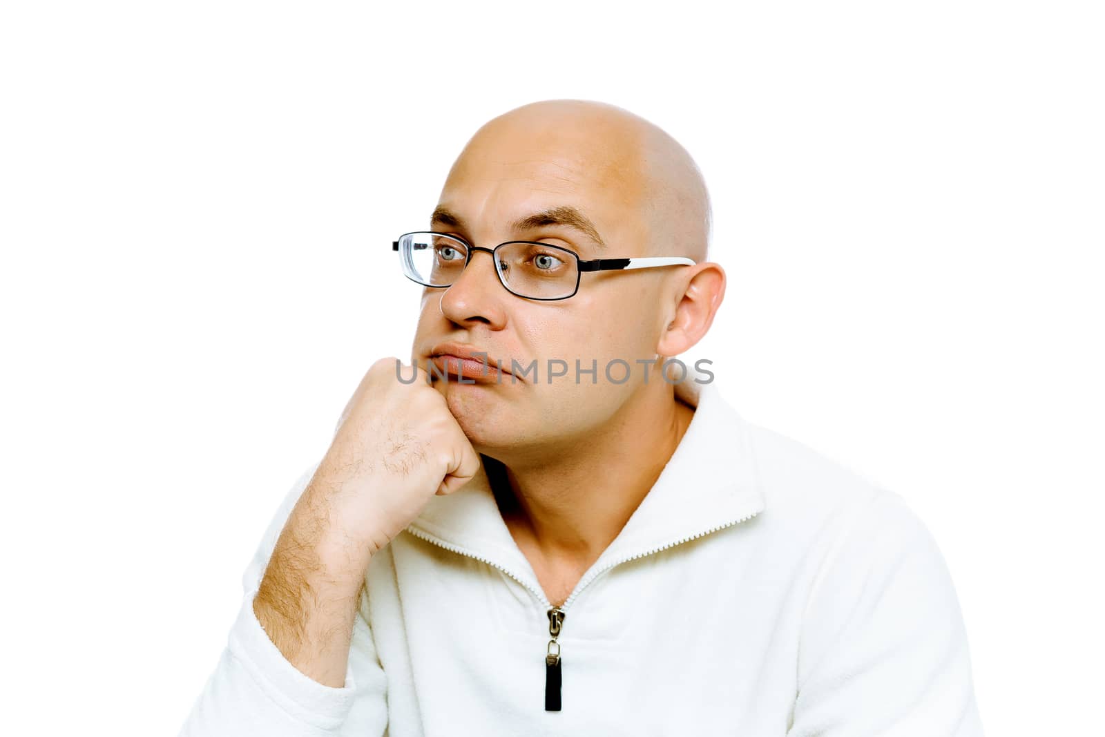 Bald pensive man in glasses. Studio. isolated