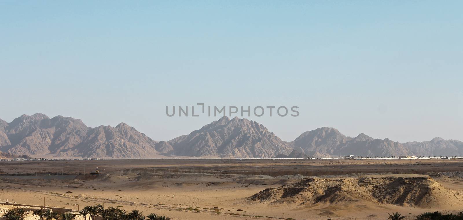 Egyptian Desert And Mysty Sky In The Daylight