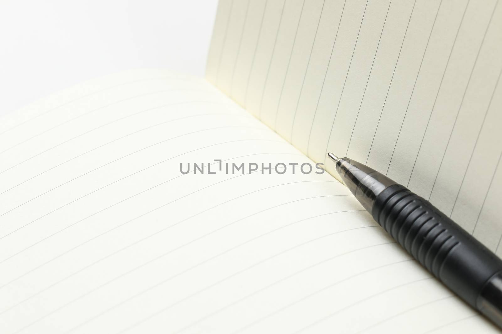 pen and blank opened notebook , business , education