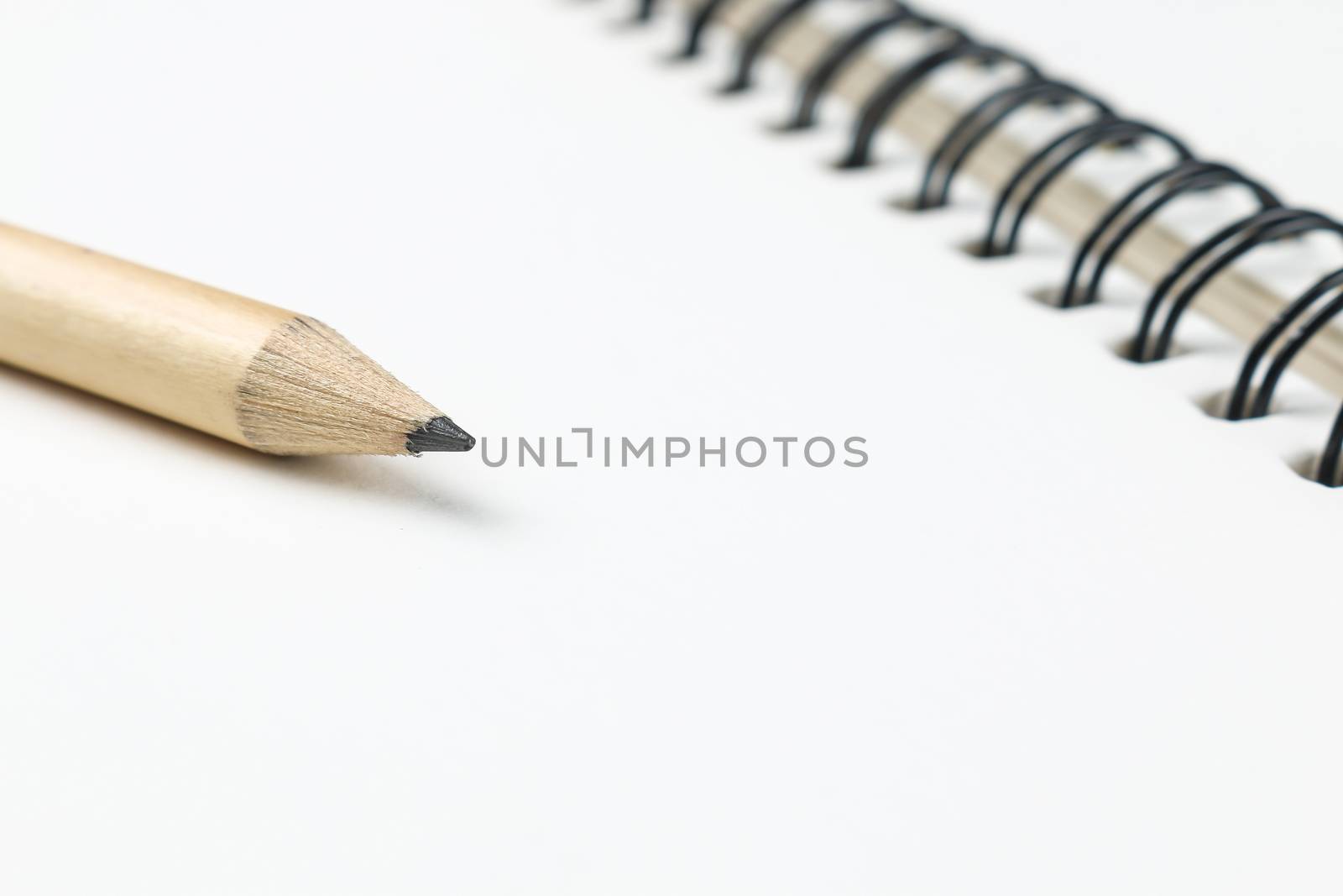 pencil and blank opened notebook by simpleBE