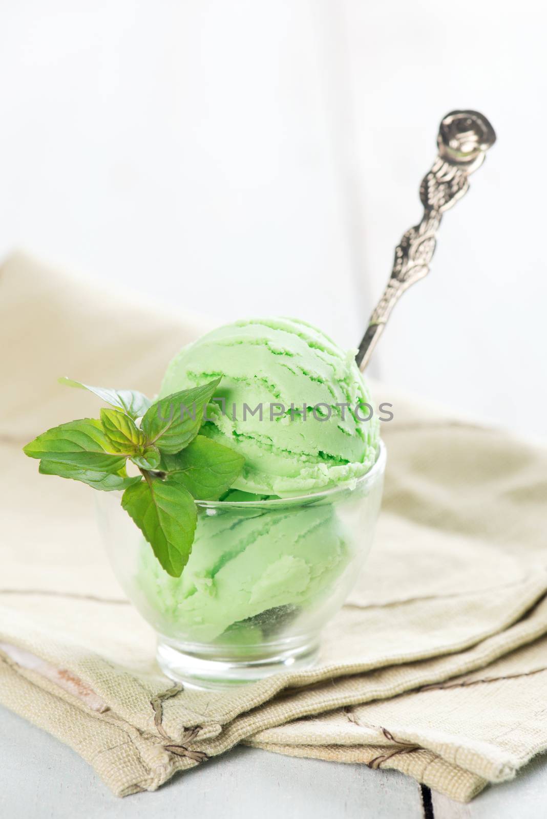 Green tea ice cream in cup by szefei