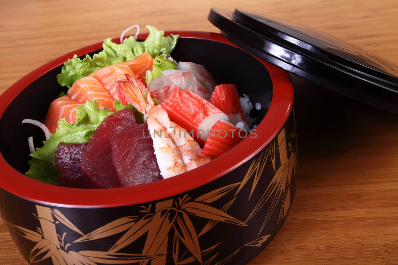 portion of sushi with salad