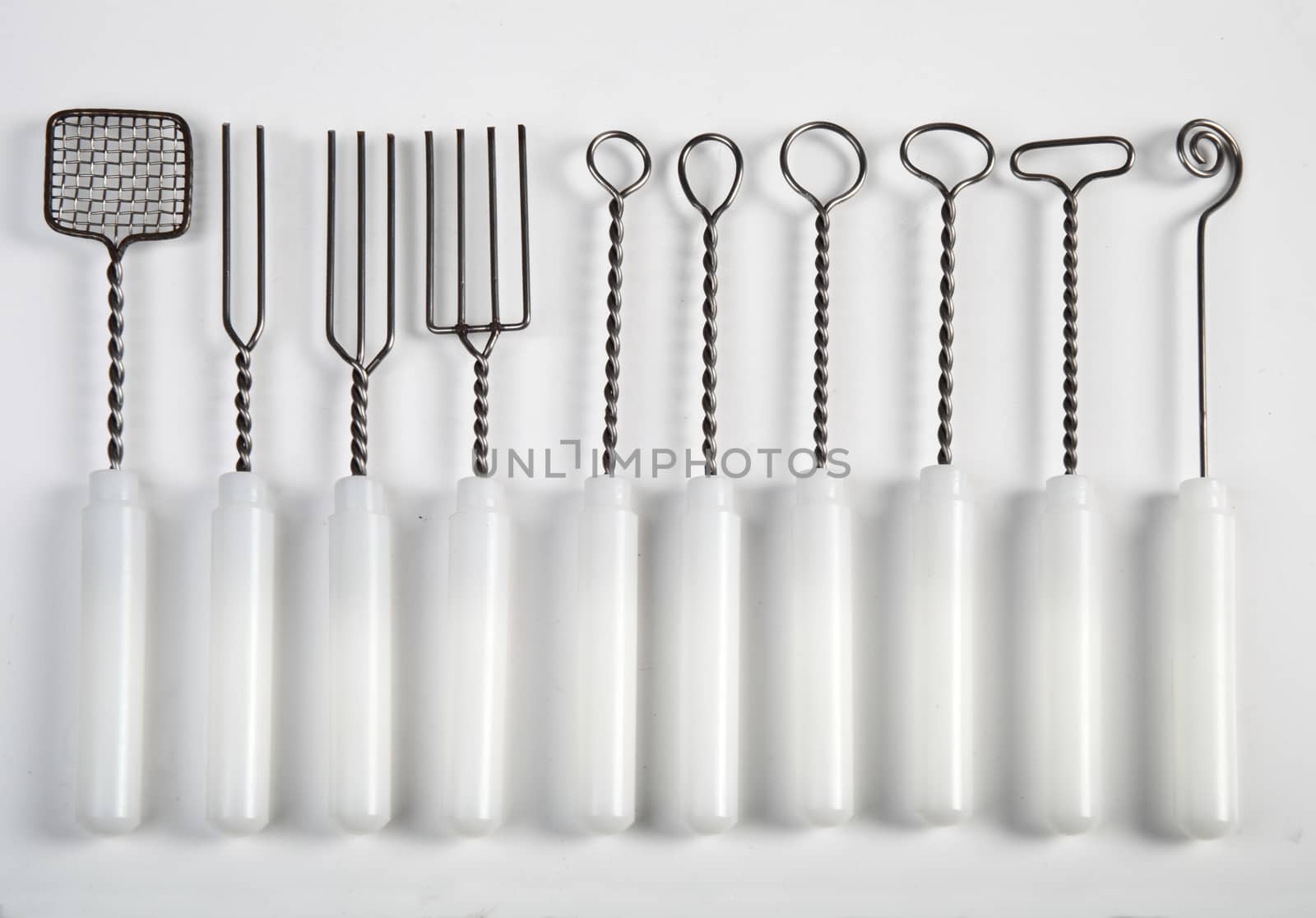 utensils for pastry on white background