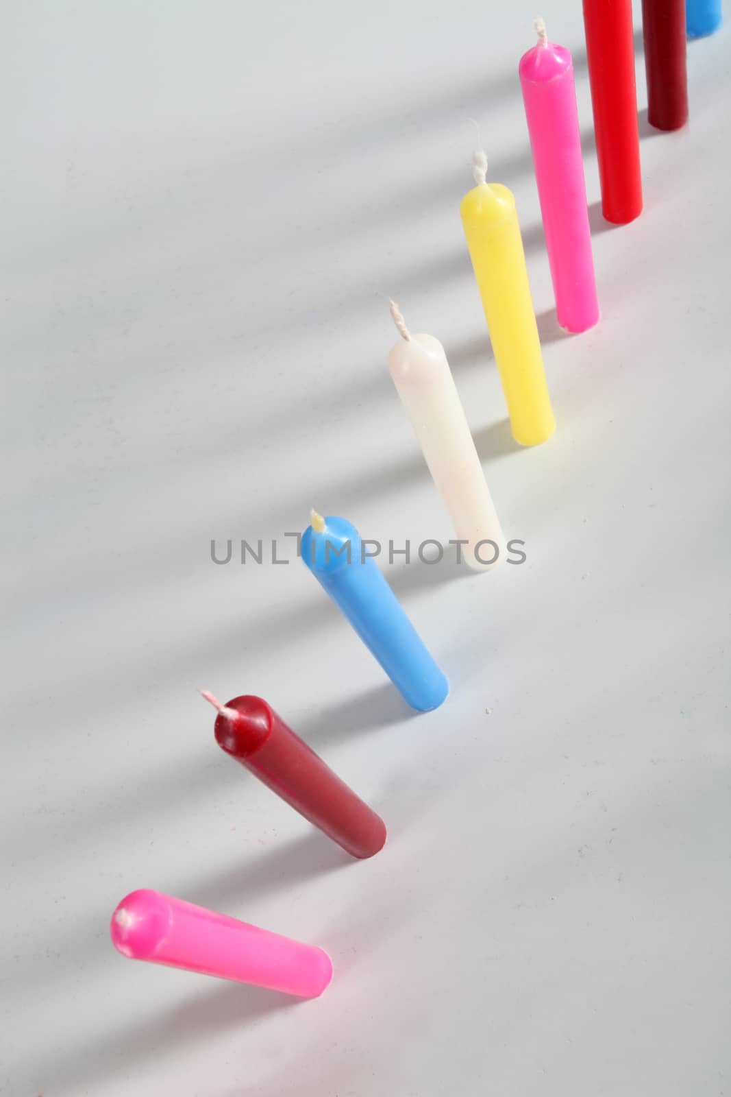 cylindrical candles colored by diecidodici