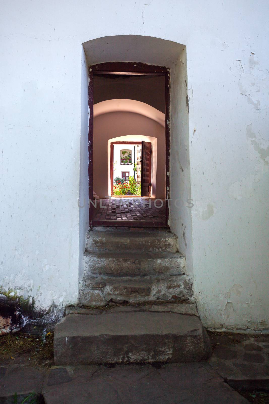 Cozia, Romania - Septemper 2, 2012: Doorway connecting the courtyards of  Cozia monastery housing the tomb of Mircea the Elder, Romania