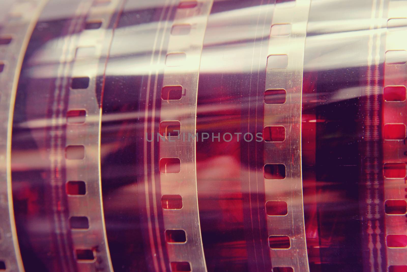 Closeup vintage photography film strip roll by cienpies