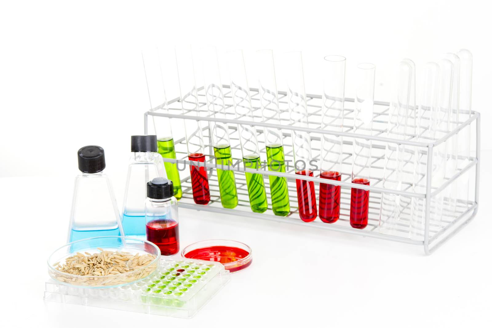 Laboratory science lab equipment containing colored liquids experiment