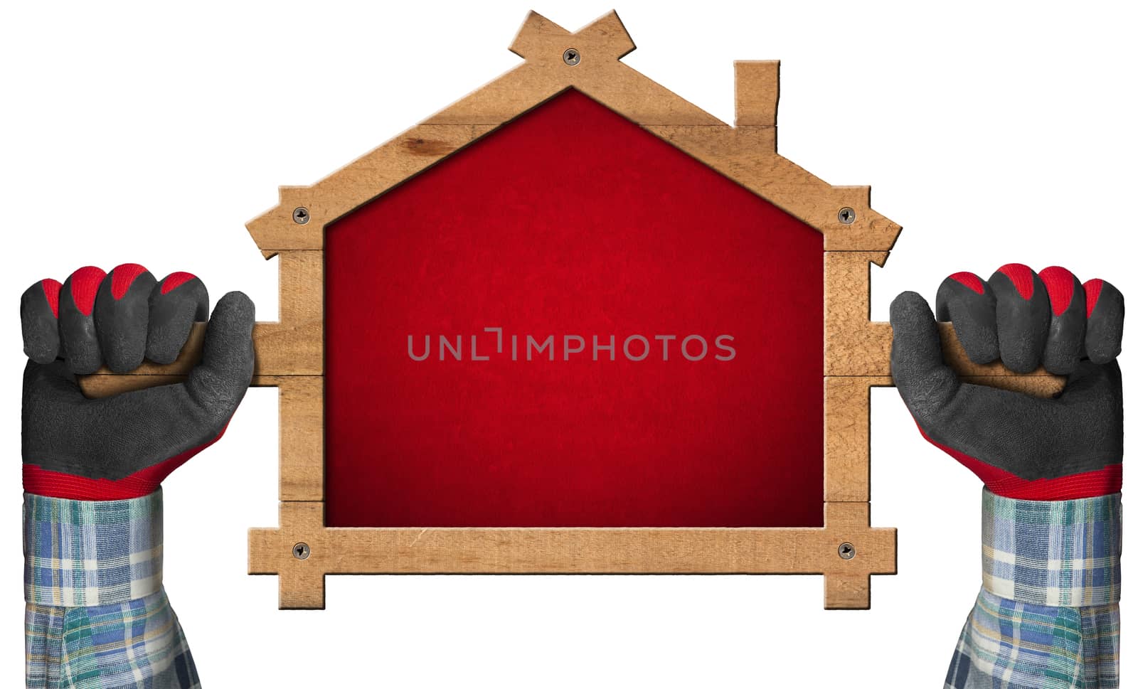 Hands with work gloves holding a wooden sign in the shape of house, isolated on white background.
