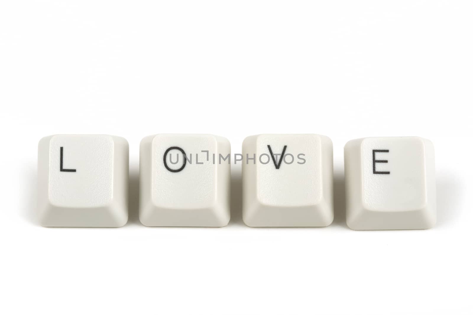 love text from scattered keyboard keys isolated on white background