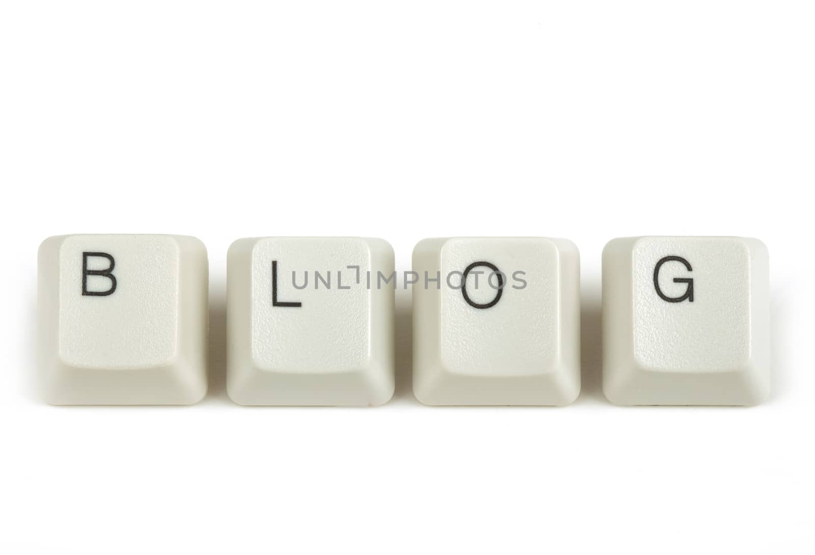 blog text from scattered keyboard keys isolated on white background