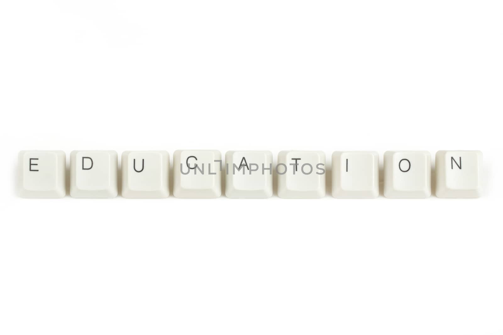 education text from scattered keyboard keys isolated on white background