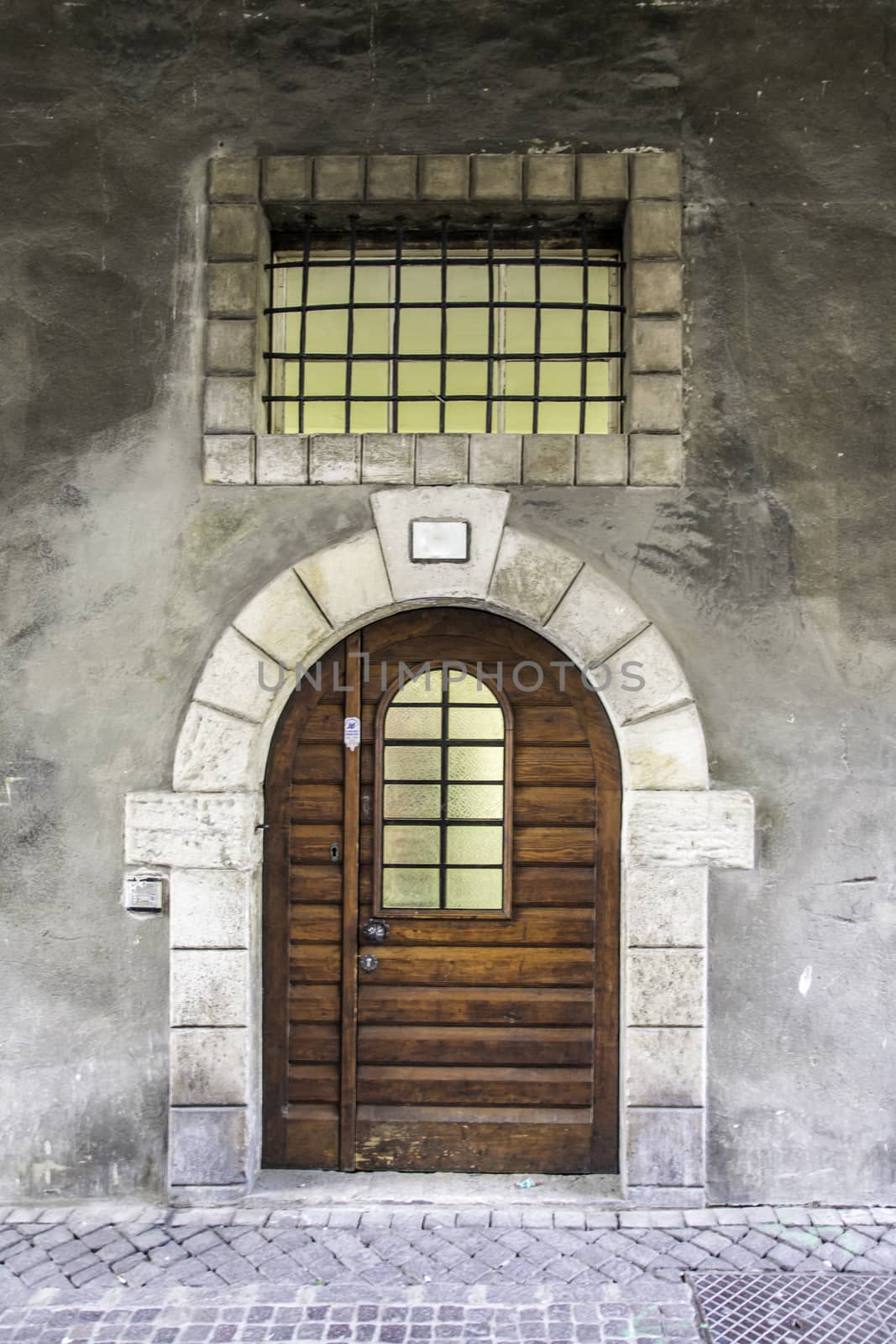 Old massive wooden door with railing by Isaac74