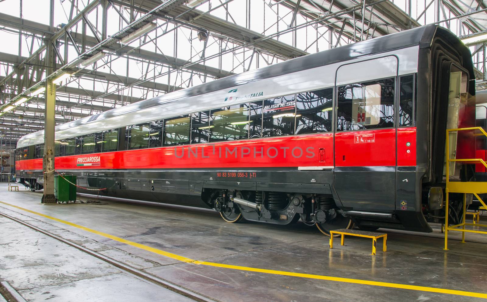 business class rail wagon in workshop