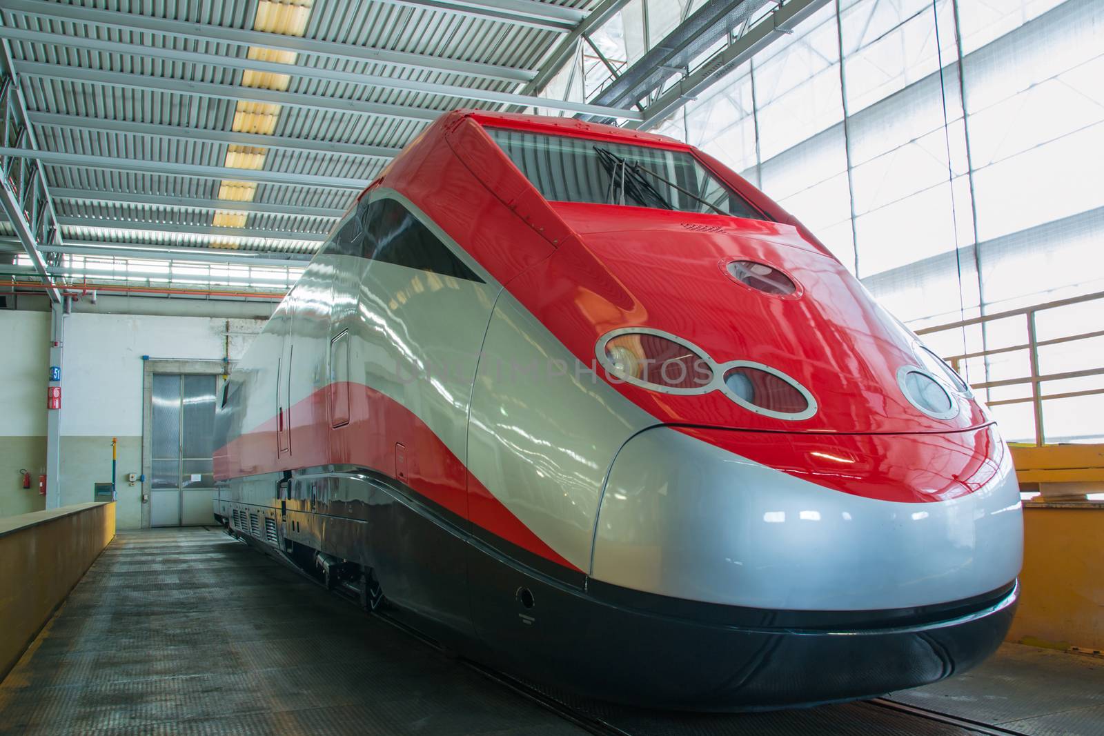 a train ready to exit from the workshop