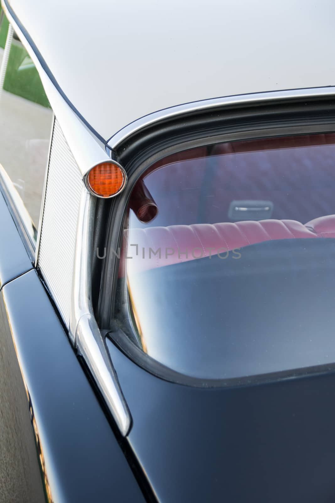 vintage car indicator and red leather seats