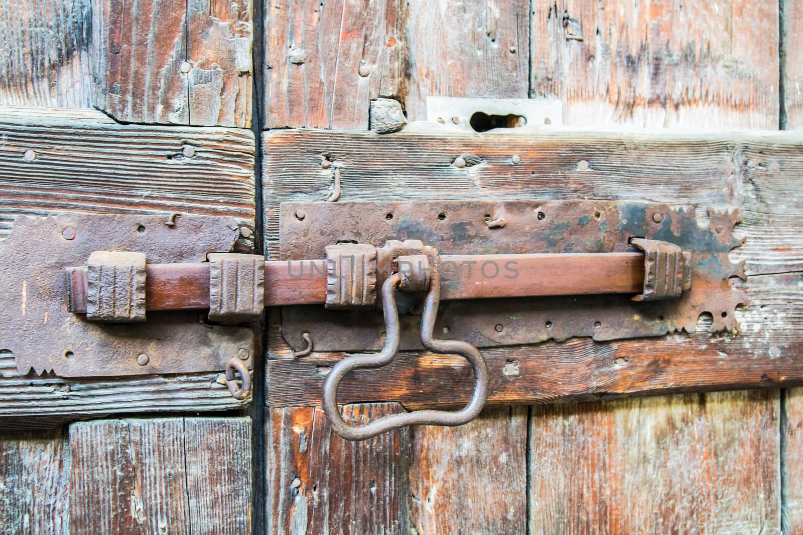 deadbolt on old wooden door