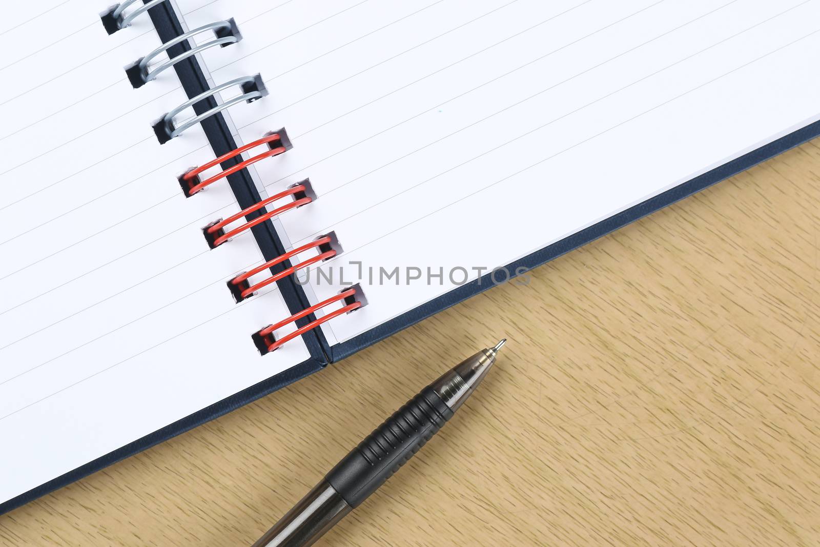 pen and blank opened notebook by simpleBE