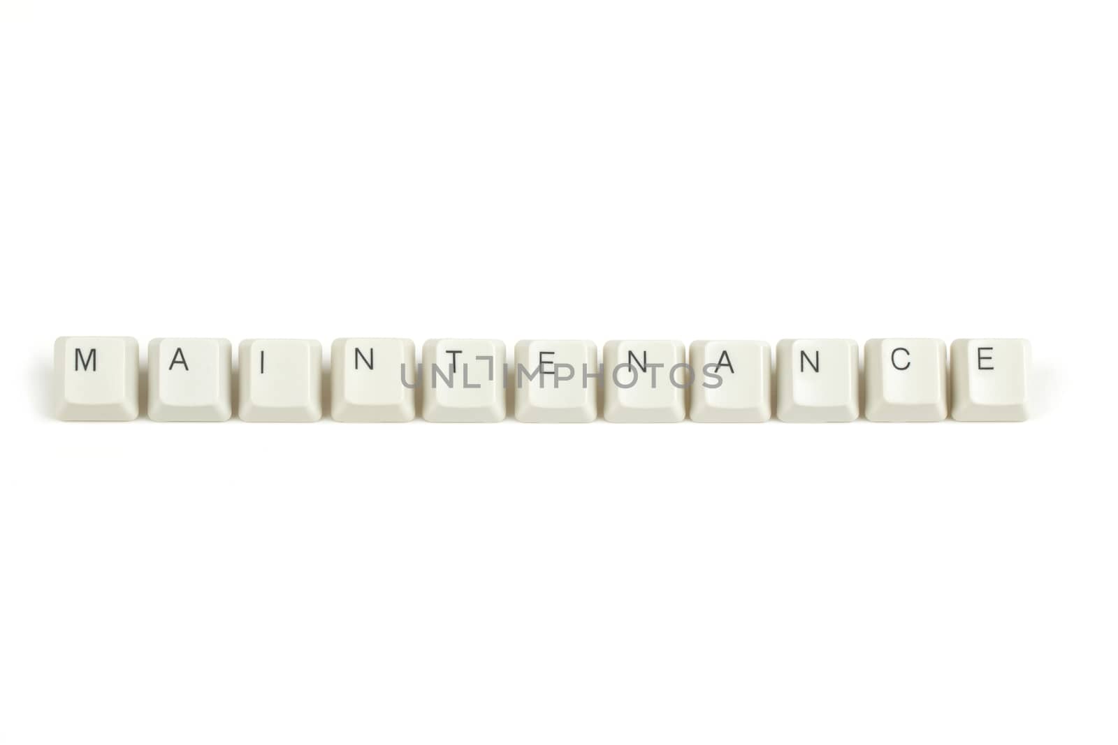 maintenance text from scattered keyboard keys isolated on white background