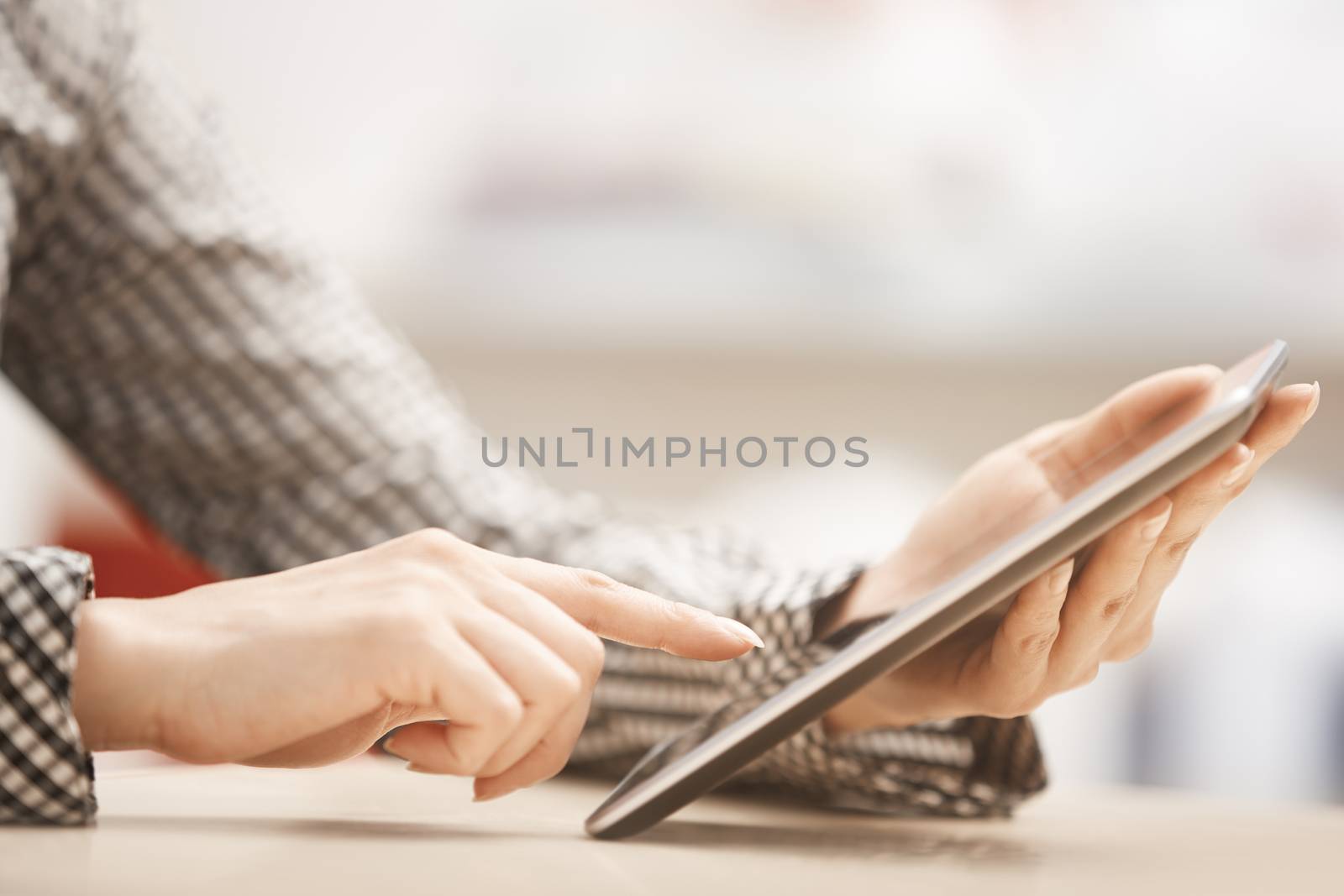Businesswoman at office working with digital tablet
