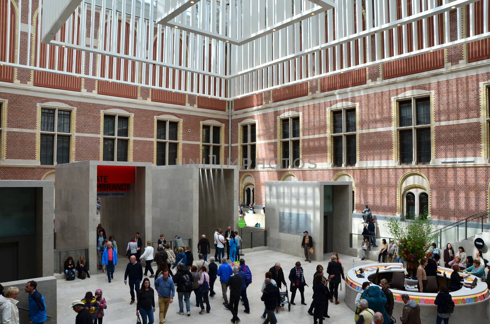 Amsterdam, Netherlands - May 6, 2015: Tourists in the modern atrium Rijksmuseum on May 6, 2015. The original interior courtyards have been redesigned to create the imposing new entrance space of the Atrium