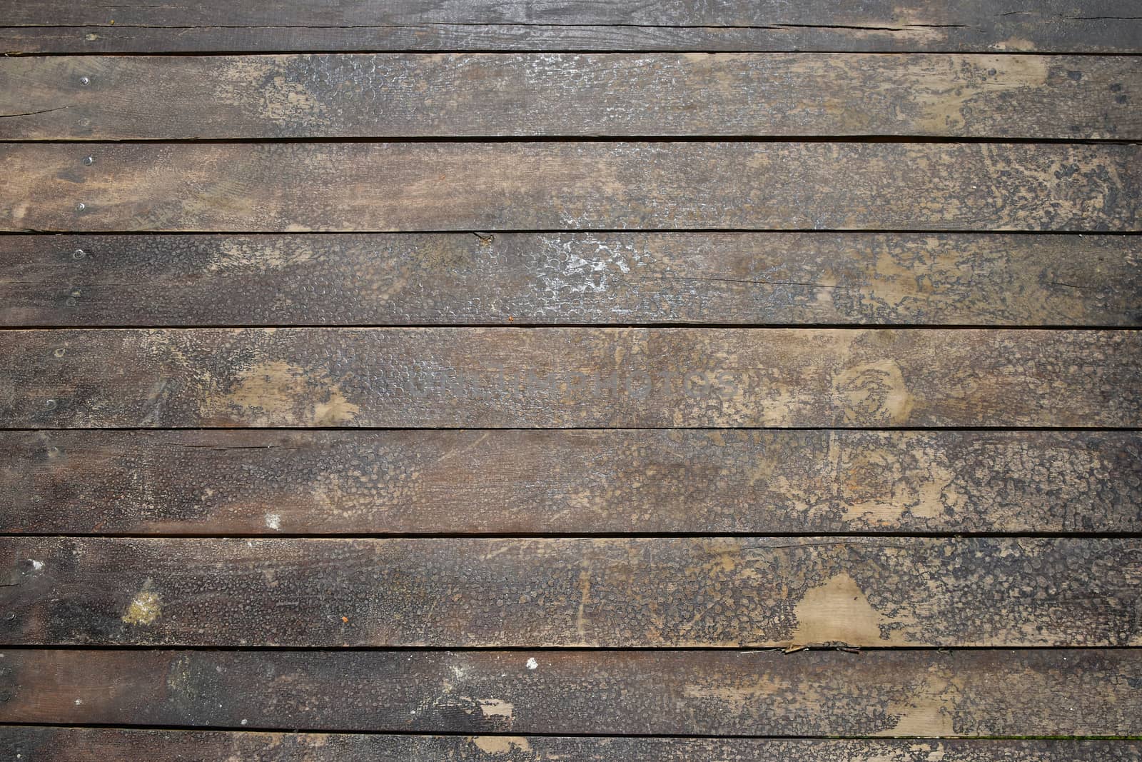 Old vintage rustic aged antique wooden sepia panel with horizontal gaps, planks and chinks