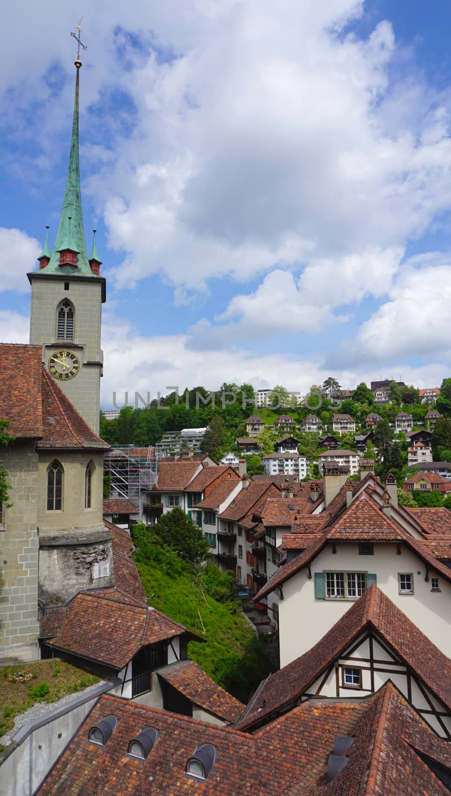 Scenery of historical old town city Church and river on bridge in Bern, Switzerland