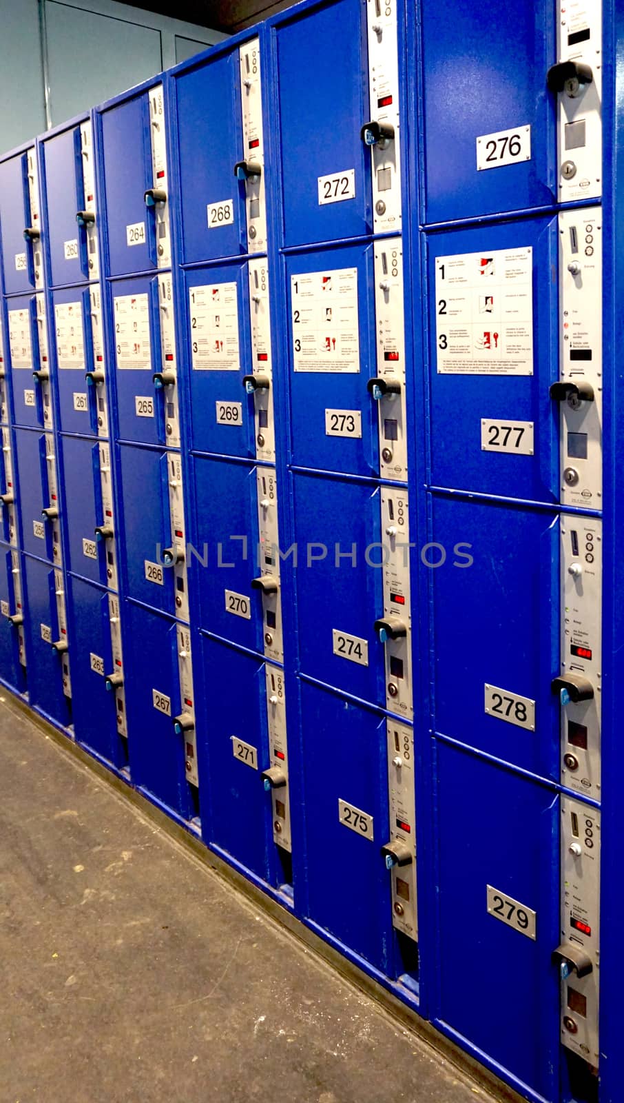 blue color Locker in train station Switzerland vertical