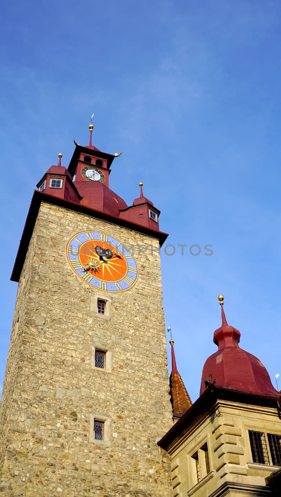 historical clock tower in old town city Lucerne, Switzerland