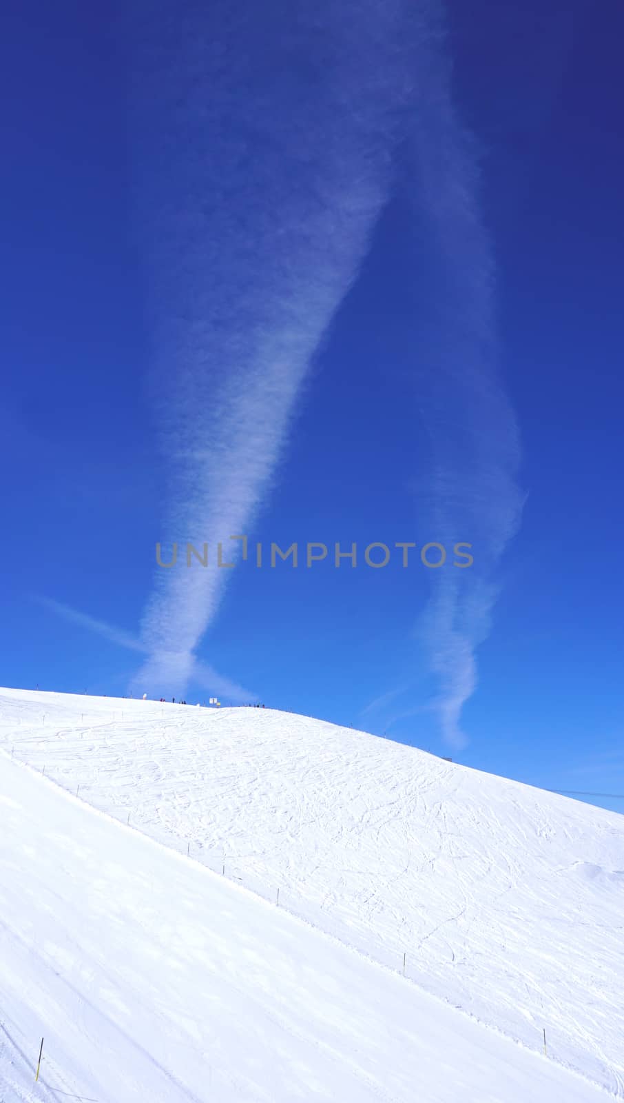 snow mountains Titlis and blue sky by polarbearstudio