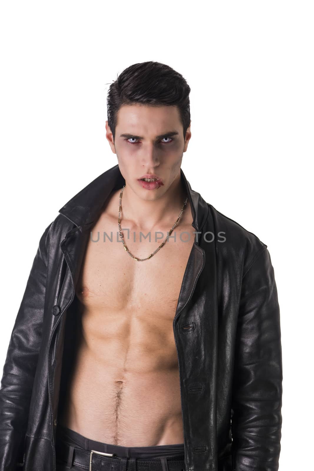 Portrait of a Young Vampire Man in an Open Black Leather Jacket, Showing his Chest and Abs, Looking at the Camera, Isolated on a White Background.