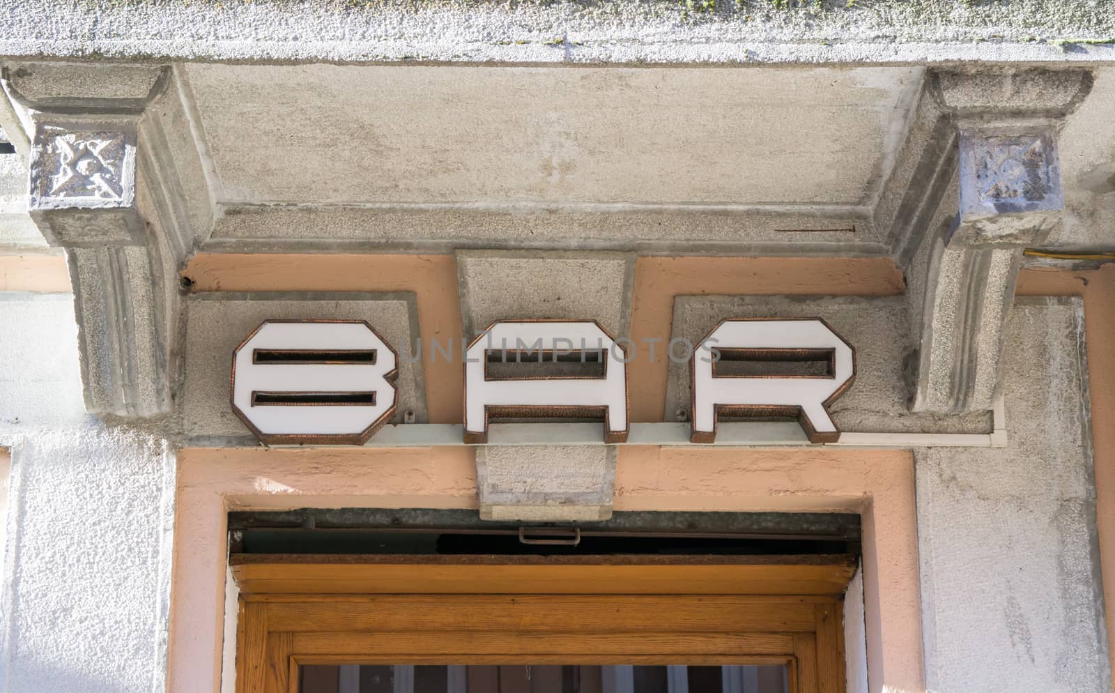 sign above the entrance of a bar