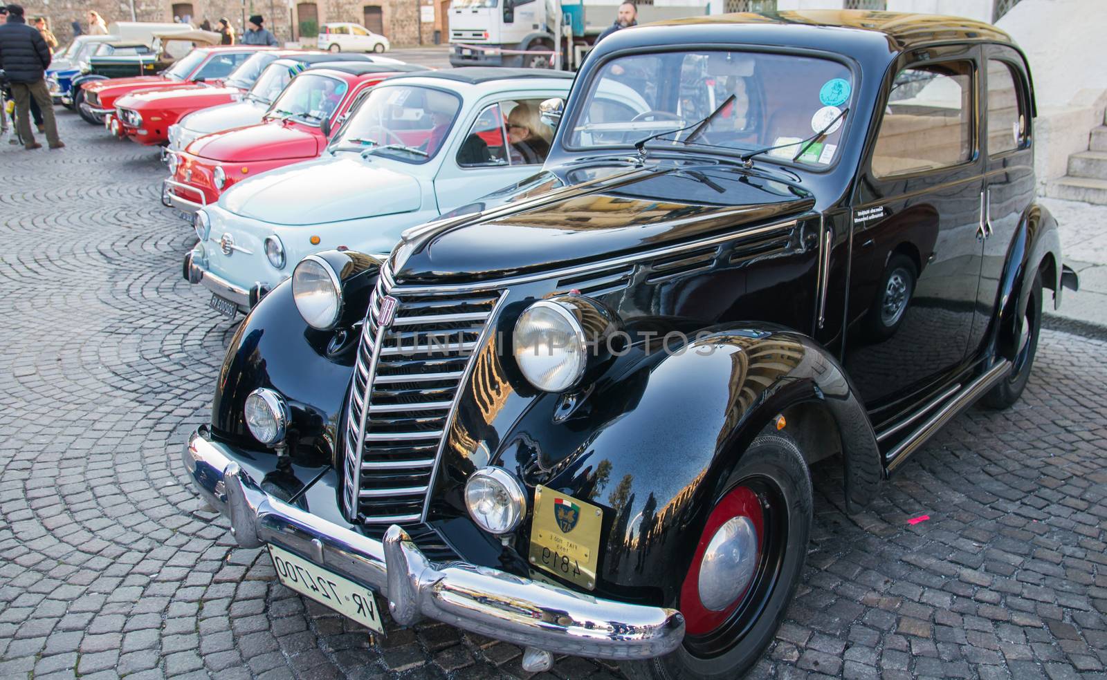 VERONA, ITALY - JANUARY 6: Classic vintage cars. Benaco Classic Autoclub organizes a gathering called "witch of the policeman" on Verona Tuesday, January 6, 2015. The proceeds are donated to charity.