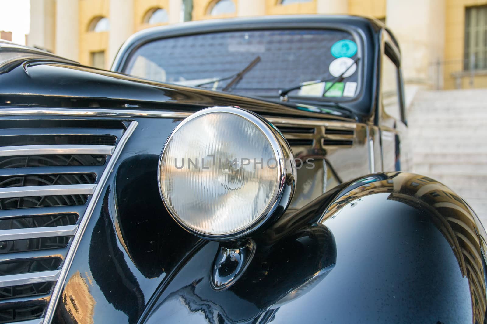 old headlight of black vintage car