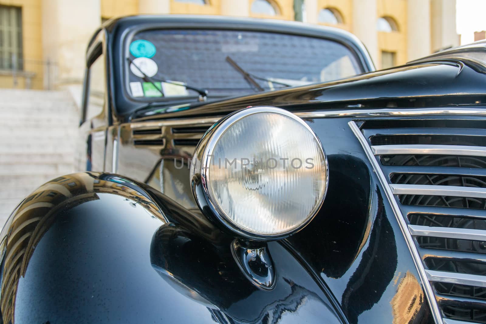 old headlight of black vintage car