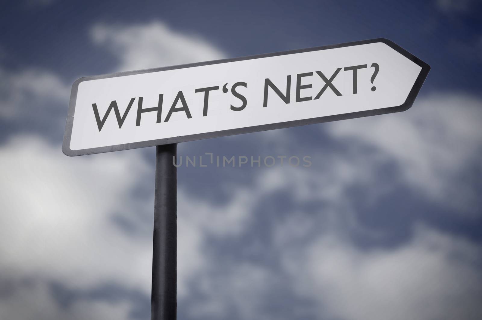 Street sign pointing to what's next