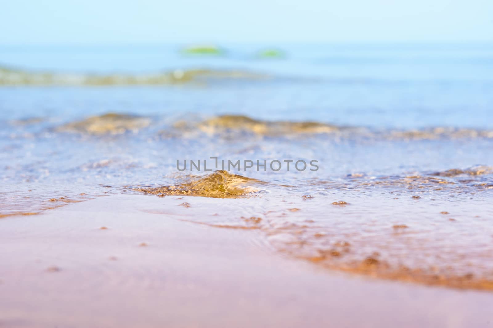 Waves on the sandy beach by styf22