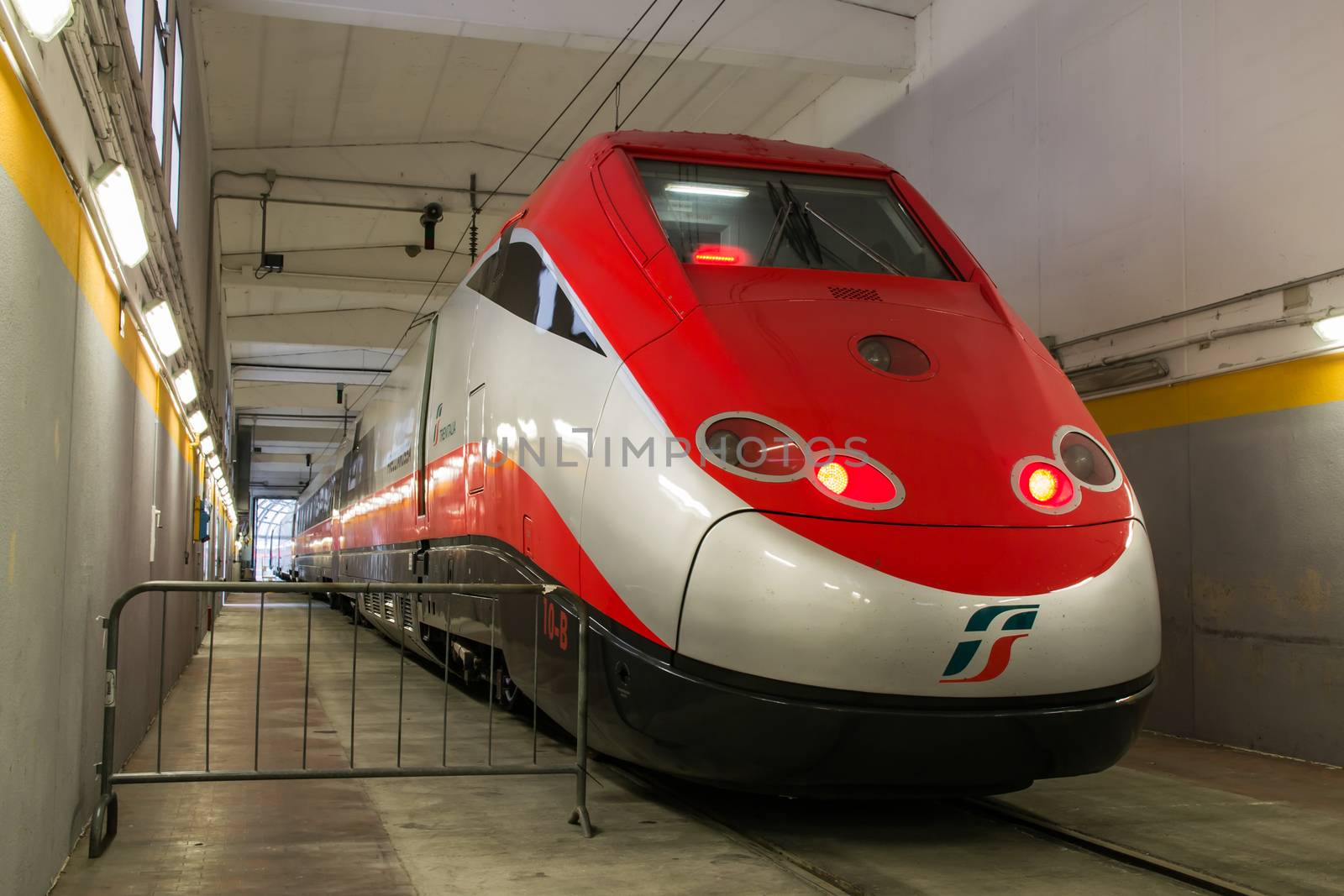 a train ready to exit from the workshop