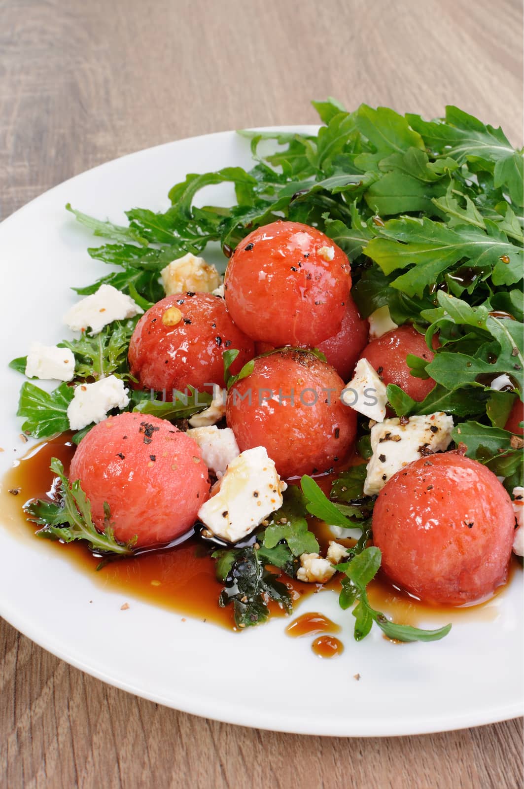 Watermelon salad with arugula and feta by Apolonia