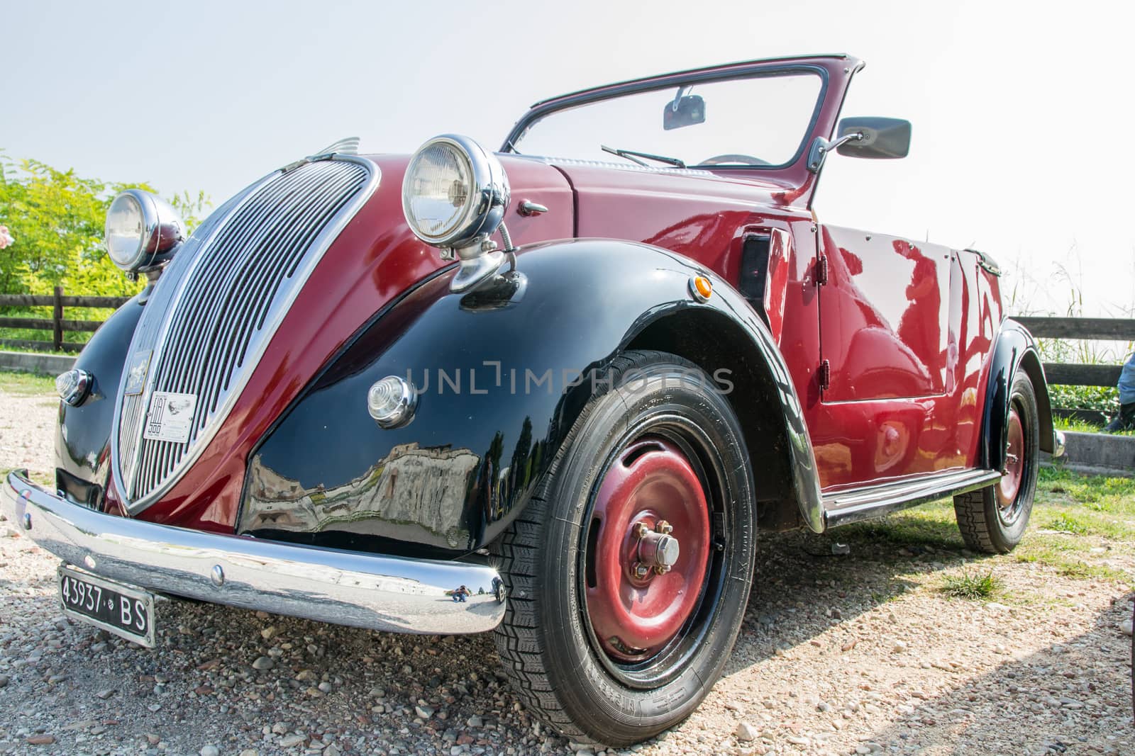 VERONA, ITALY - SEPTEMBER 27: Topolino car. Topolino Autoclub Italia organizes a gathering on Lake Garda Sunday, September 27, 2014. Cars and enthusiasts from all over Italy.