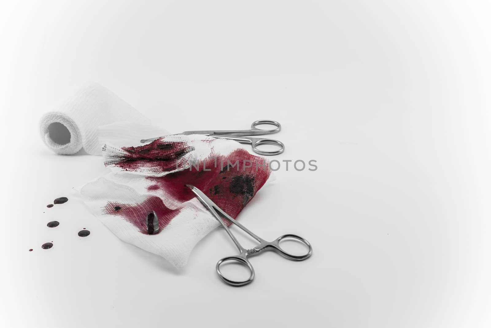 Surgical composition with bullet, blood and bandage