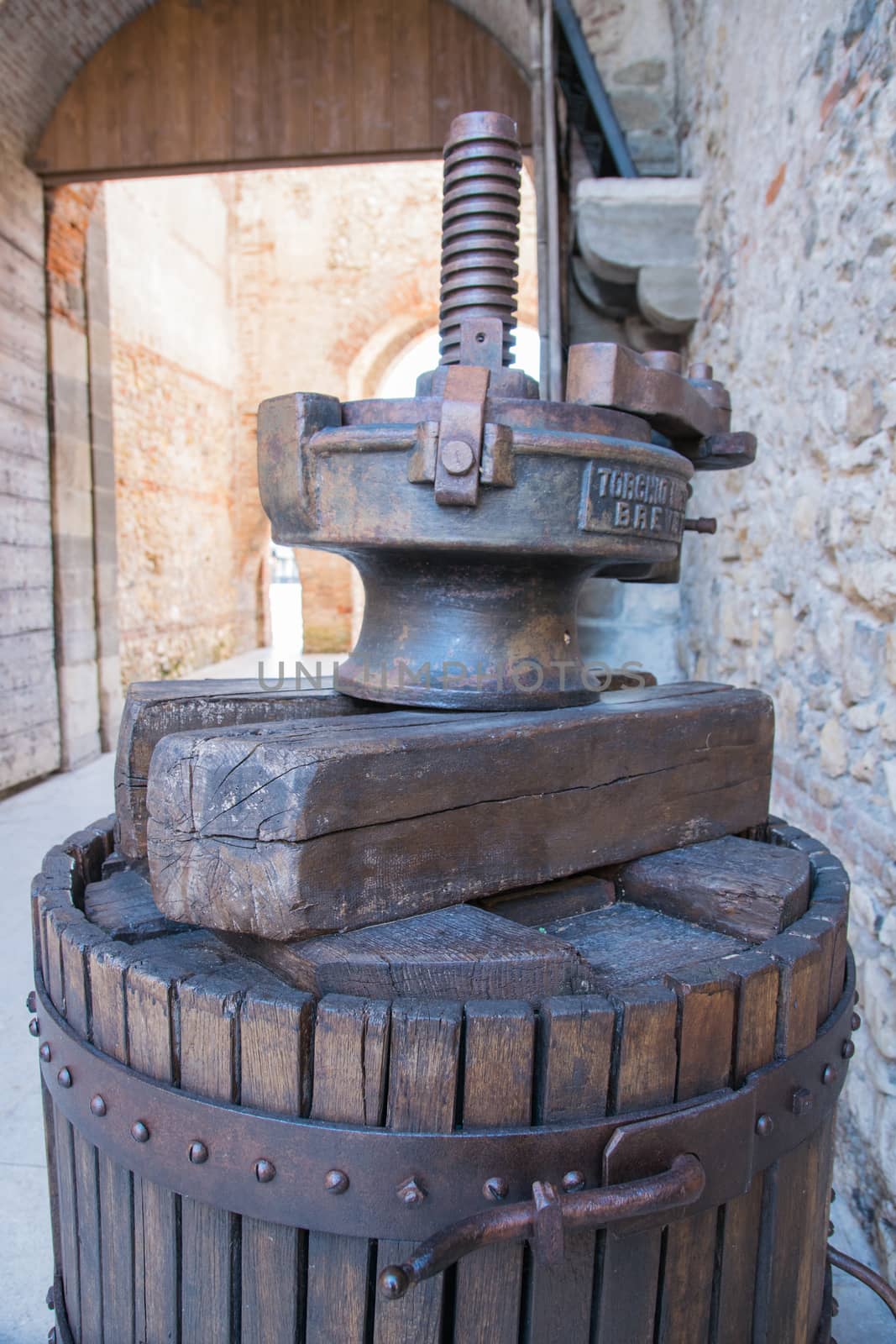 old wooden manual press used to press the grapes and make wine by Isaac74