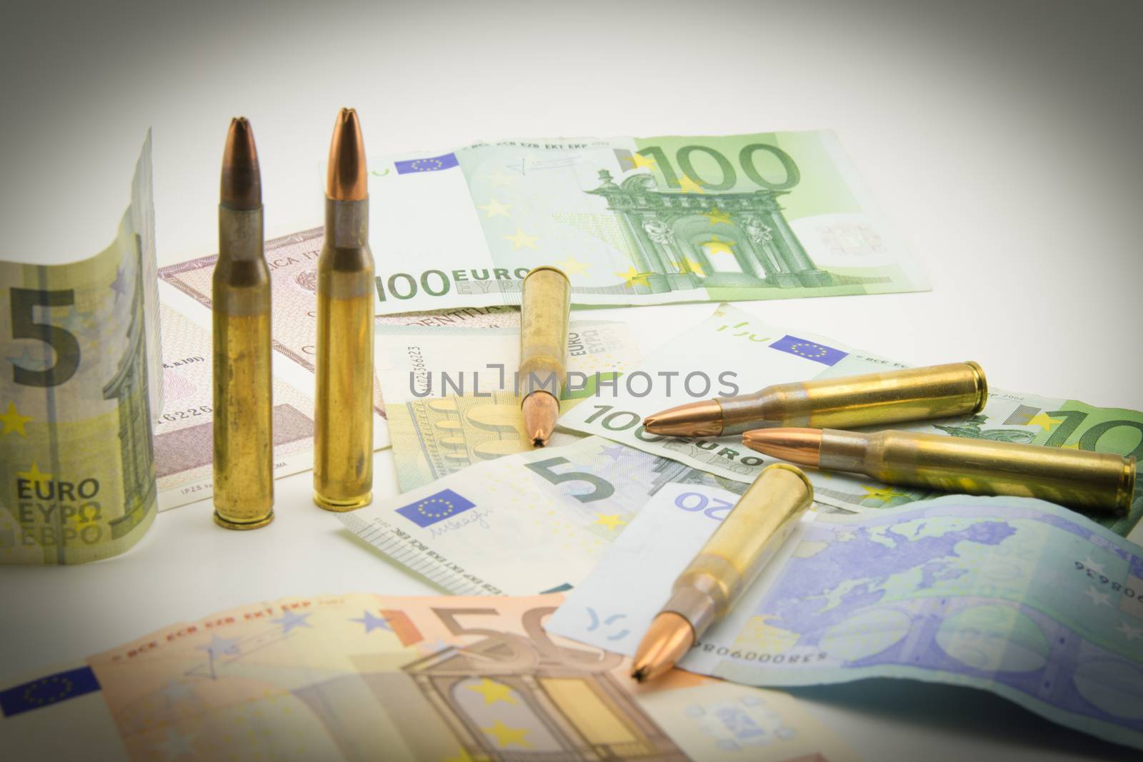 composition with bullets and banknotes