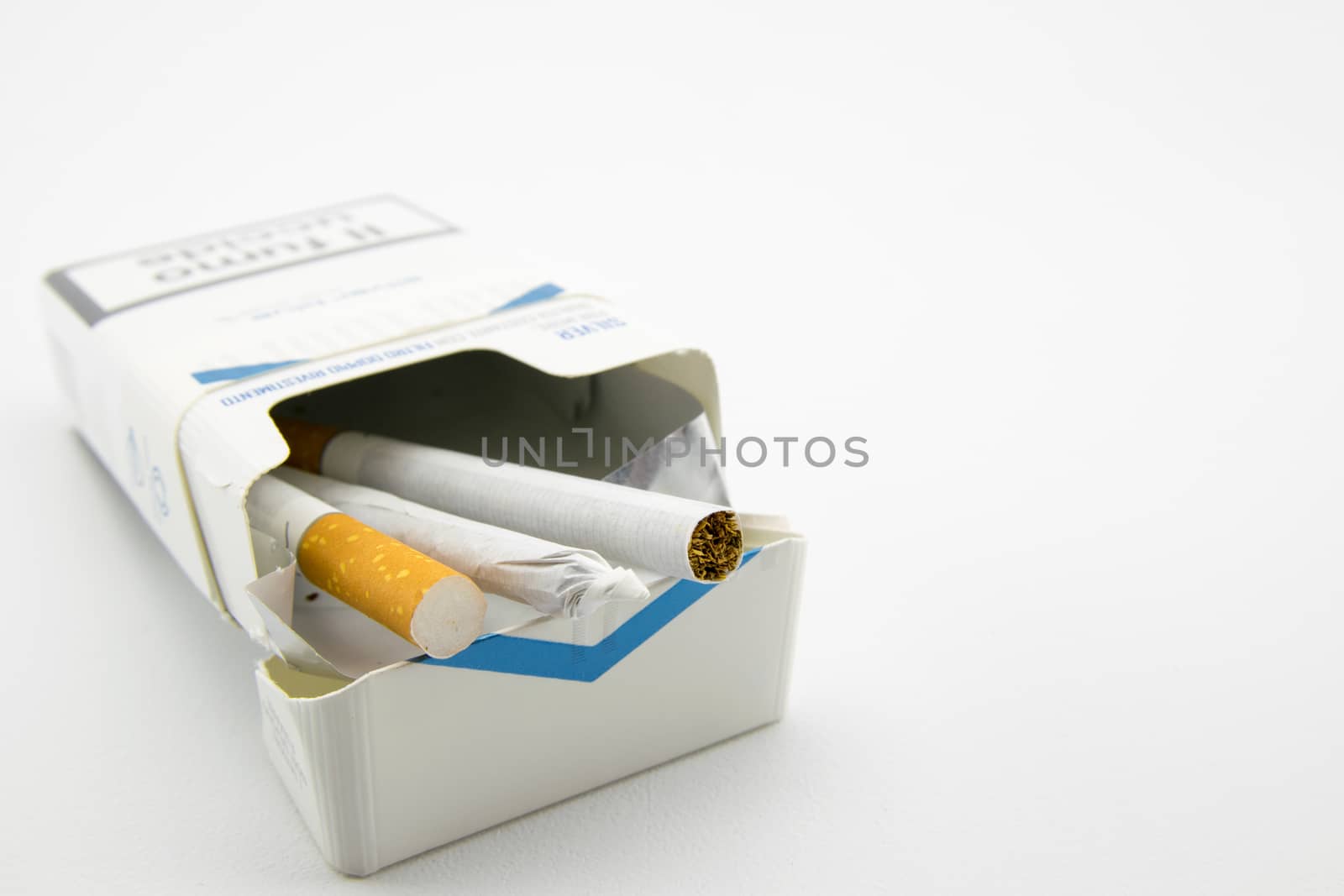 two cigarettes and a hand-rolled cigarette in the pack