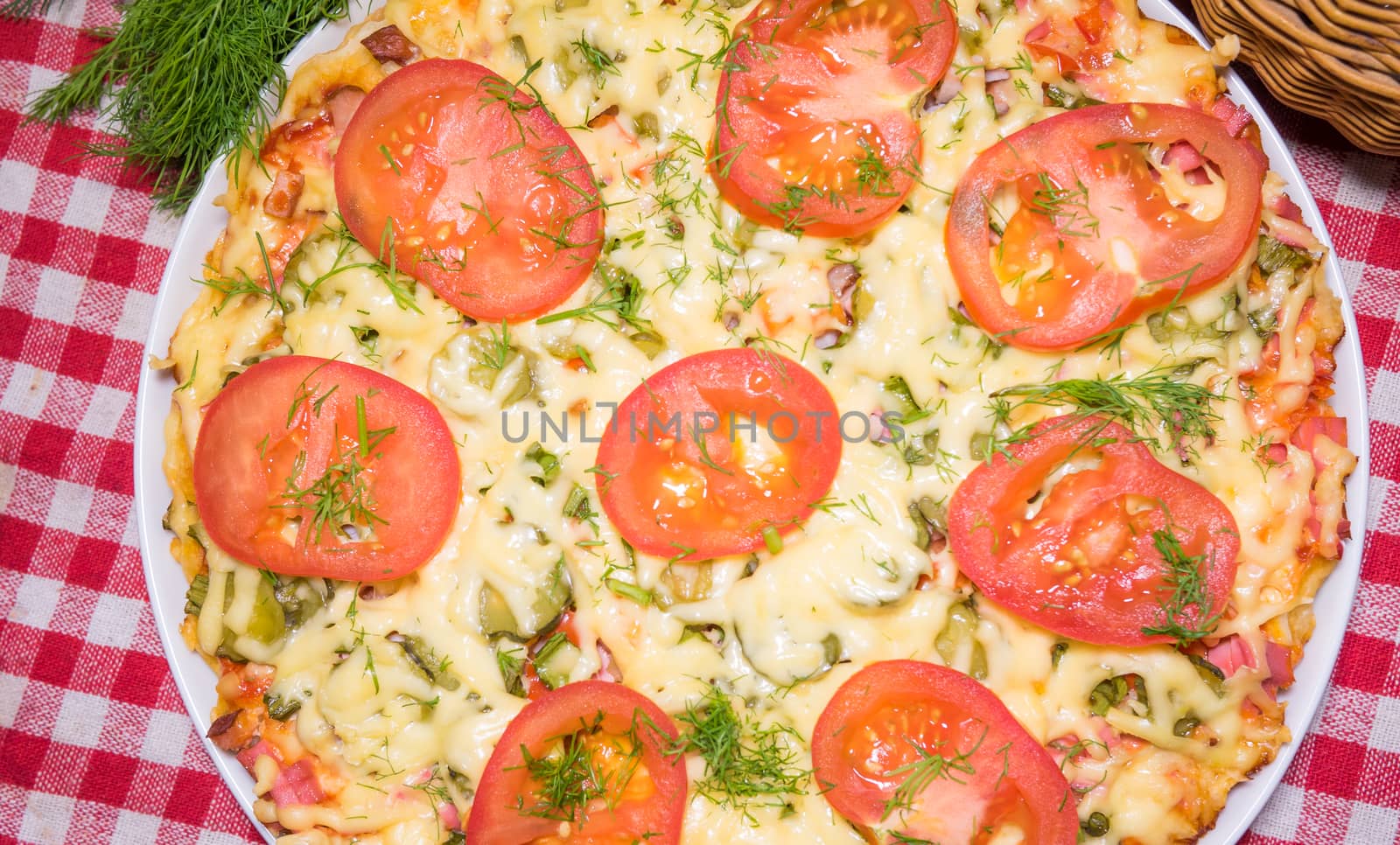 Italian pizza with meat, tomatoes ,dill and double cheese